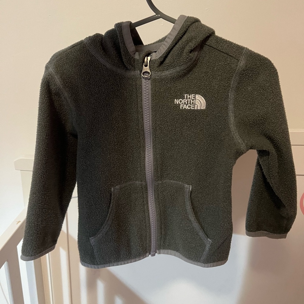 The North Face Baby fleece zip up hooded jacket. 12-18 months